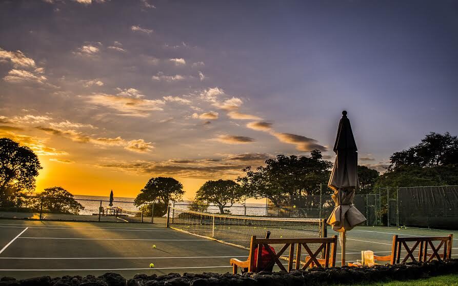 Mauna Kea Resort tennis court at sunset